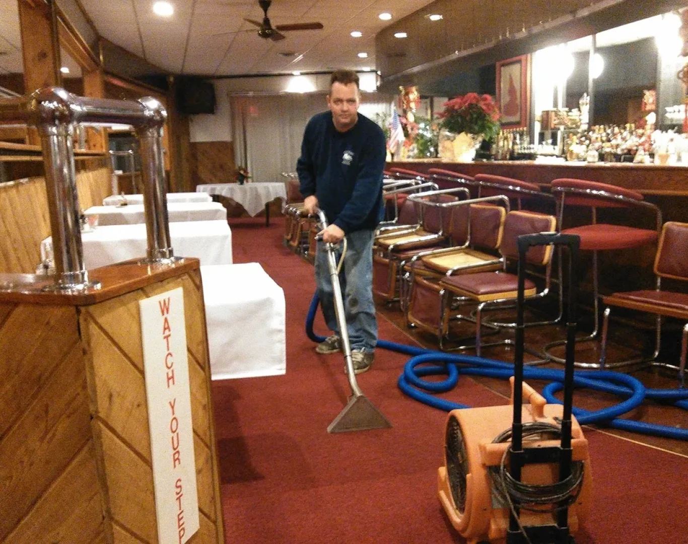 Cleanway Cleaning & Restoration team performing professional carpet cleaning in a Buffalo, NY home.